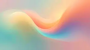 淡いピンクやオレンジや水色のパステルカラーが滑らかに混ざり合う抽象的なウェーブ背景