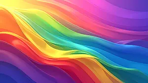 Abstract background of vivid rainbow colors like red, yellow, blue, and purple waving like ribbons
