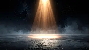 Mysterious space background illustration where a single orange light illuminates a concrete floor from a starry sky